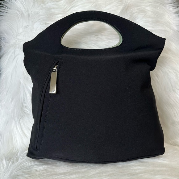 🔥BLACK FRIDAY SALE LIMITED TIME🔥
Authentic Salvatorre Ferragamo Reversible Bag - Picture 7 of 10